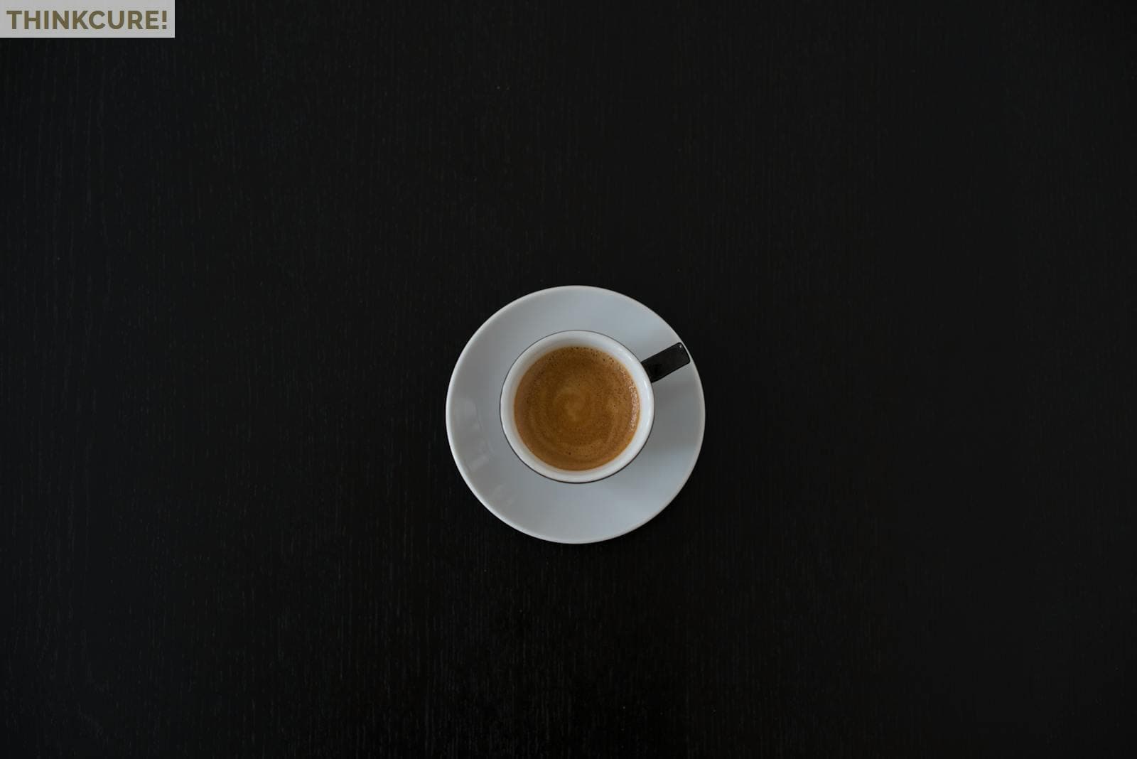 White Ceramic Coffee Cup on White Saucer